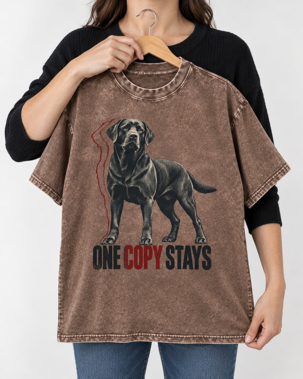 One Copy Stays Labrador Retriever Washed Tee in Coffee, held up on a hanger