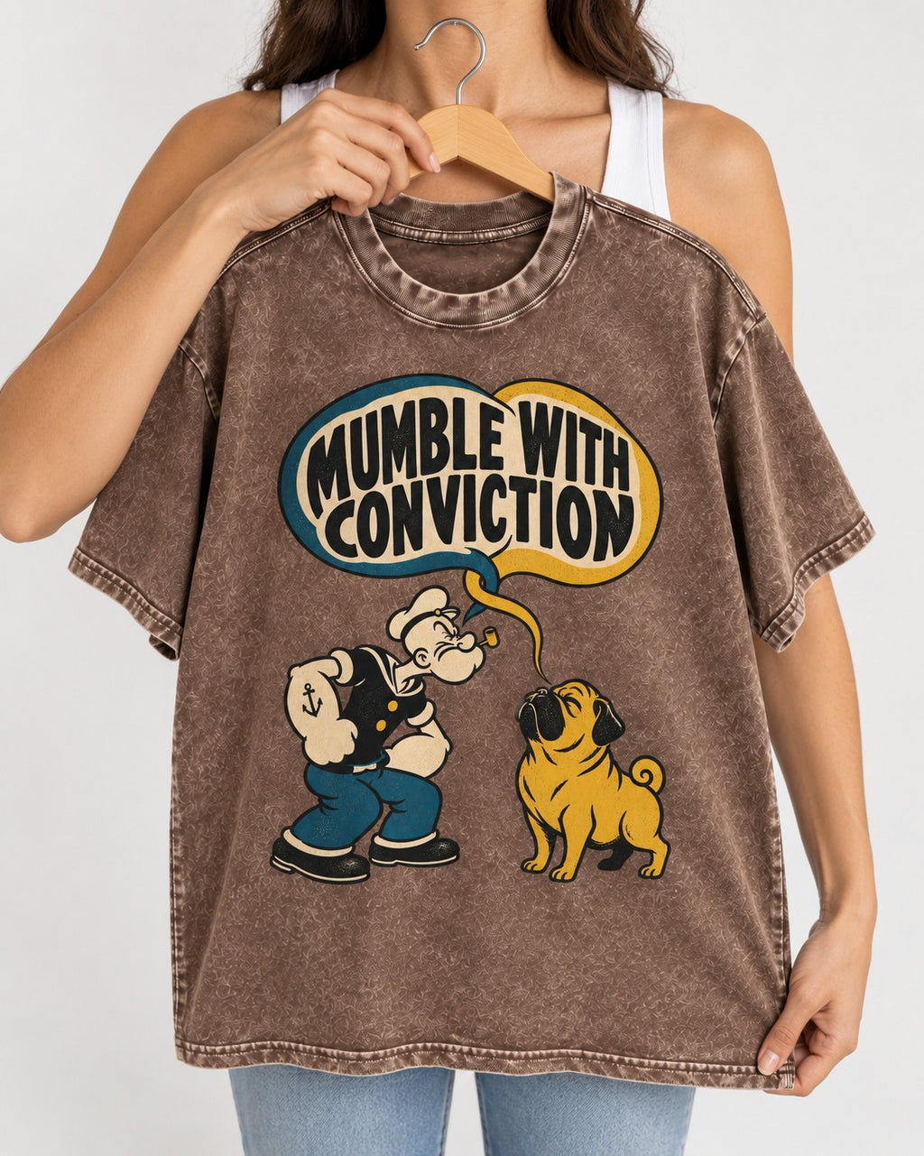 Pug Mumble with Conviction Washed Tee in Coffee, held up on a hanger