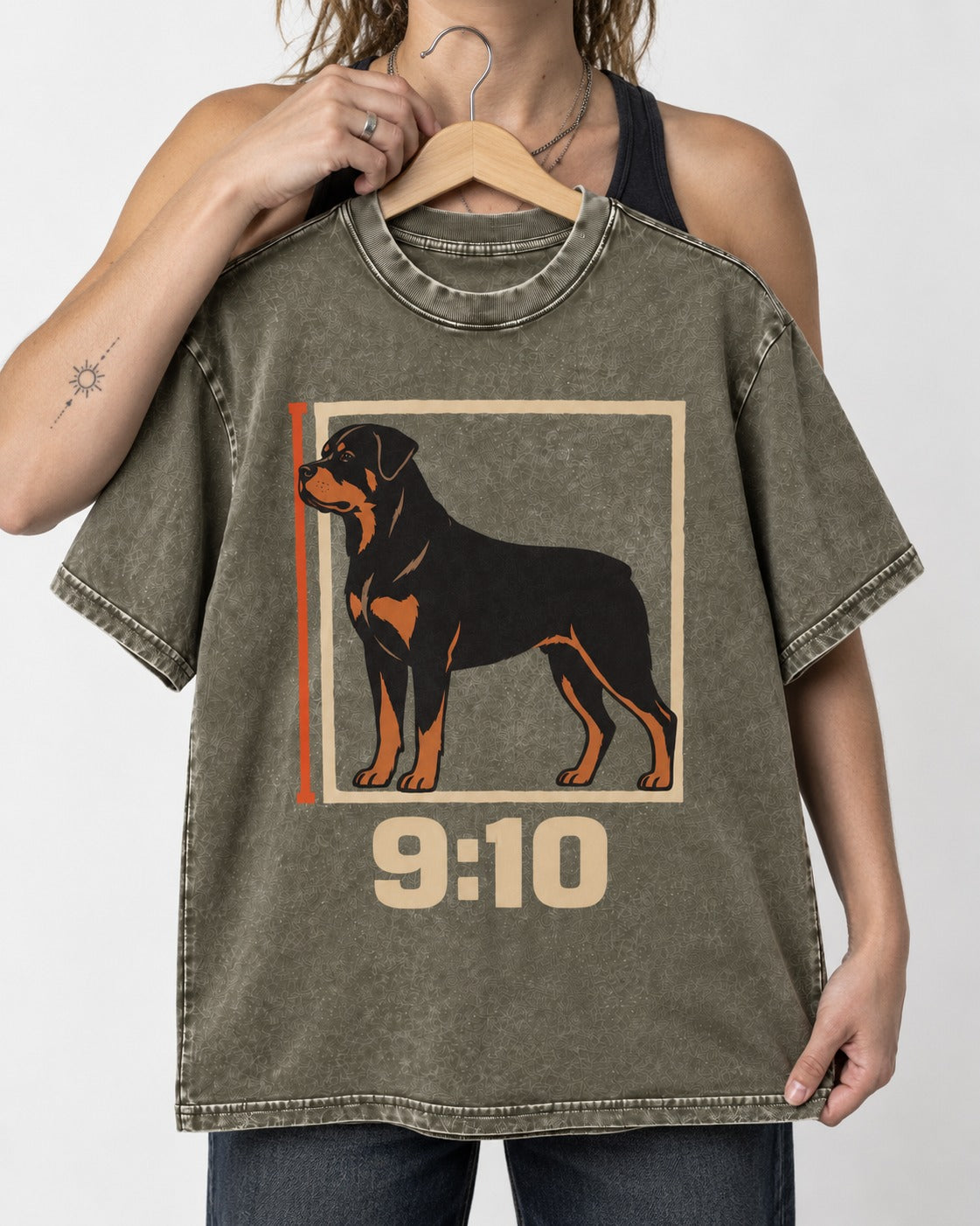 Nine Ten Rottweiler Proportion Frame Graphic Washed Tee in Army Green, held up on a hanger