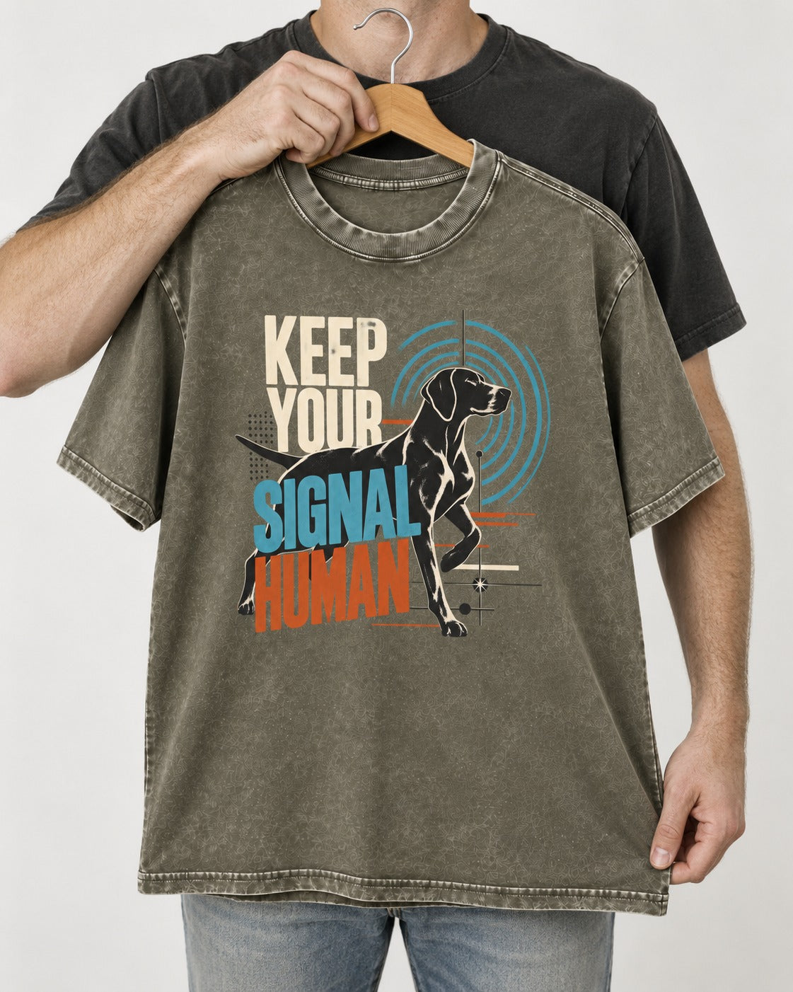 German Shorthaired Pointer Keep Your Signal Human Broadcast Graphic Washed Tee in Army Green, held up on a hanger