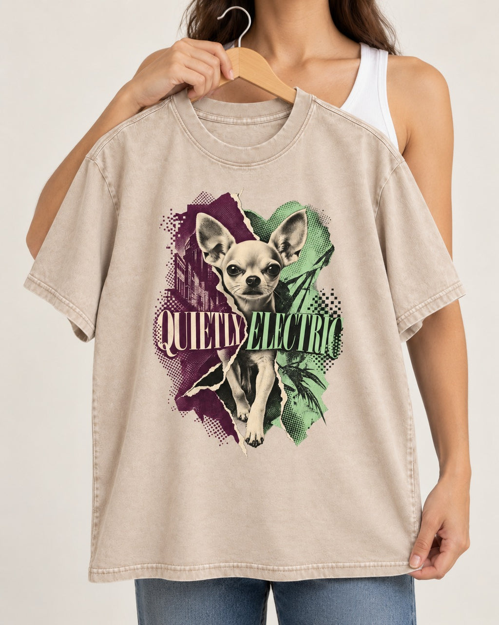 Chihuahua Quietly Electric Washed Tee in Apricot, held up on a hanger