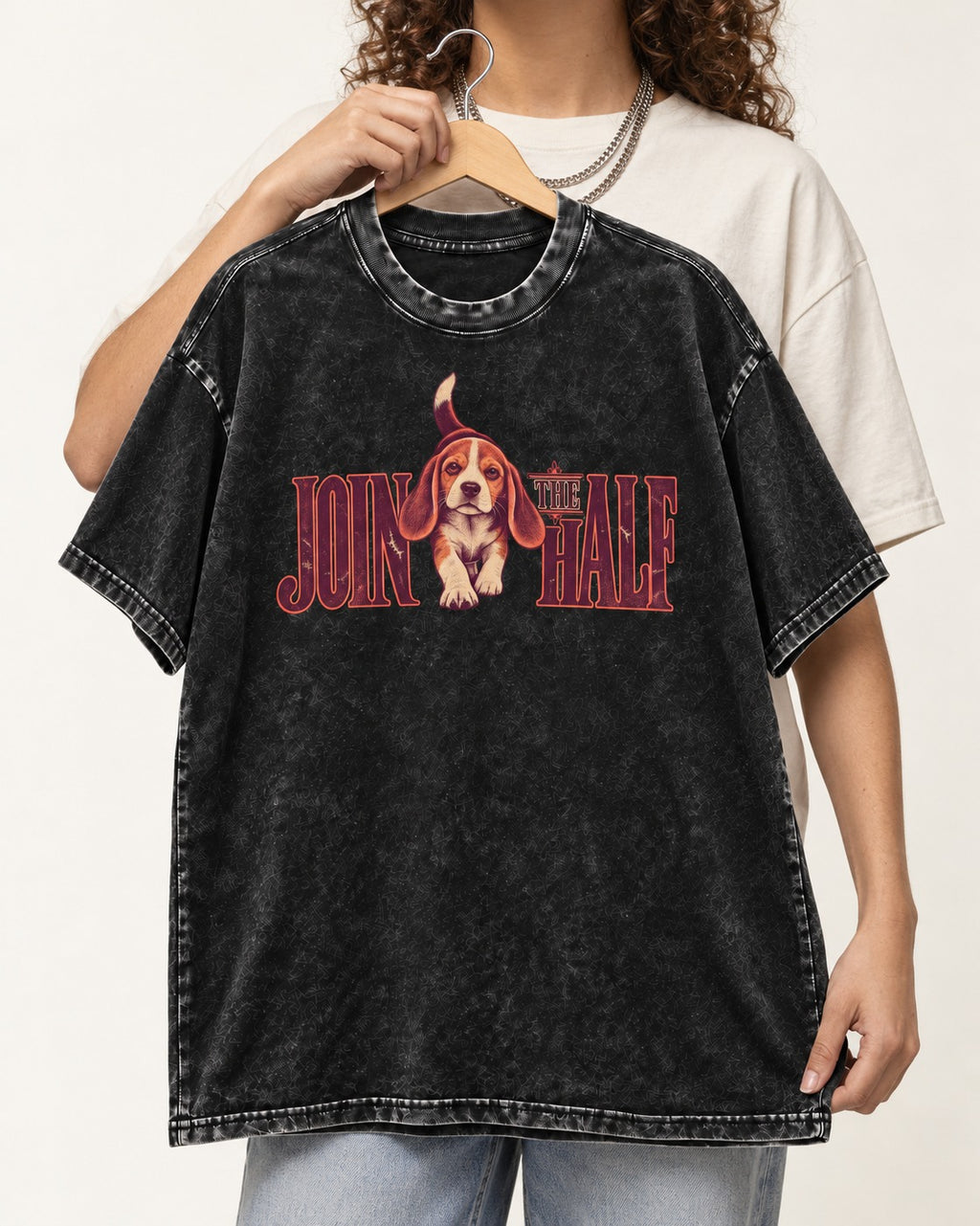Beagle Join The Half Washed Tee in Black, held up on a hanger