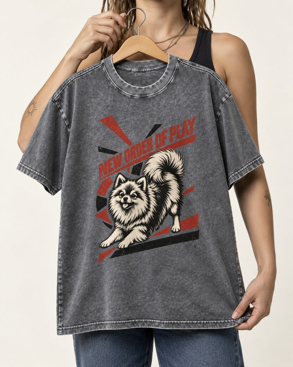 Pomeranian Order of Play Washed Tee in Gray, held up on a hanger