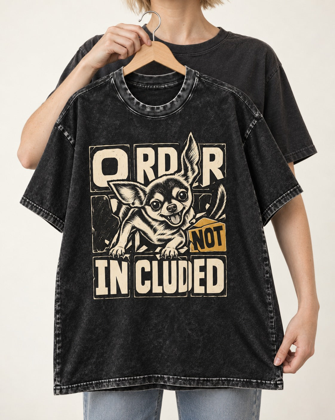 Chihuahua Order Not Included Broken Grid Graphic Washed Tee in Black, held up on a hanger