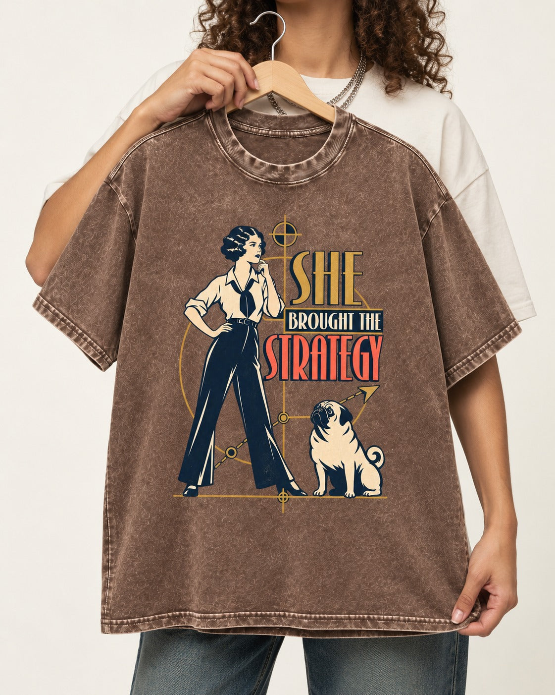 The Pug Strategy Washed Tee in Coffee, held up on a hanger