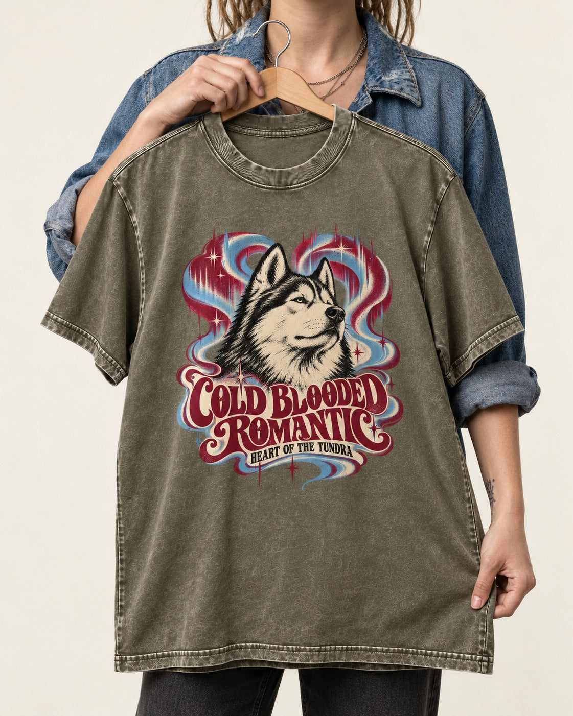 Husky Cold Blooded Romantic Heart of the Tundra Graphic Washed Tee in Army Green, held up on a hanger
