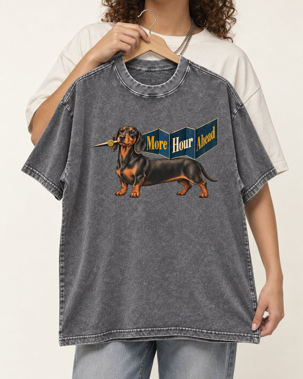 Dachshund More Hour Ahead Foldout Banner Graphic Washed Tee in Gray, held up on a hanger