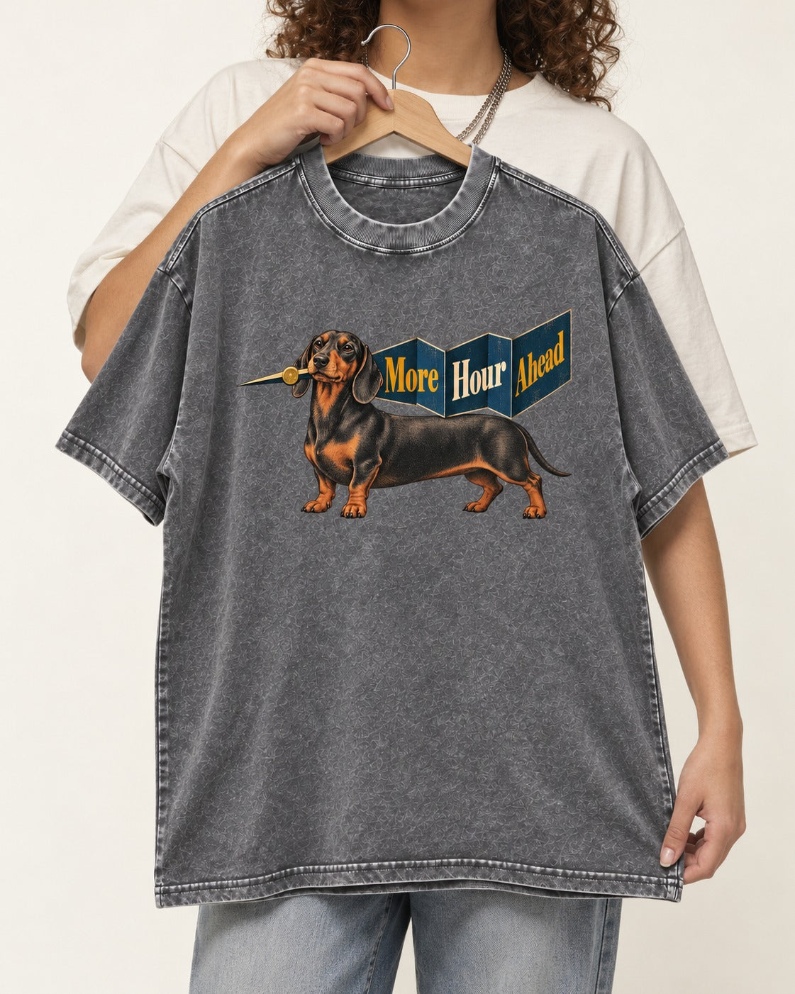 Dachshund More Hour Ahead Foldout Banner Graphic Washed Tee in Gray, held up on a hanger