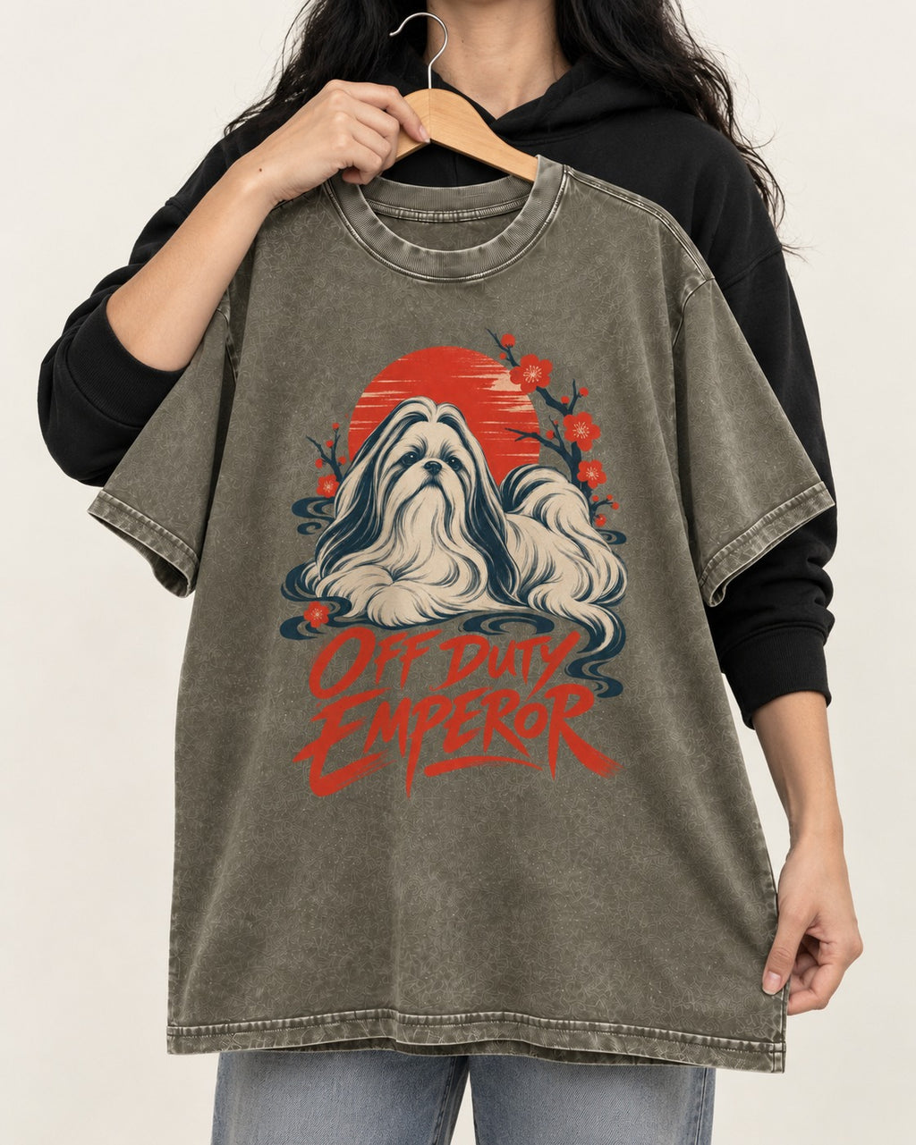 Shih Tzu Off Duty Emperor Sunset Blossom Graphic Washed Tee in Army Green, held up on a hanger