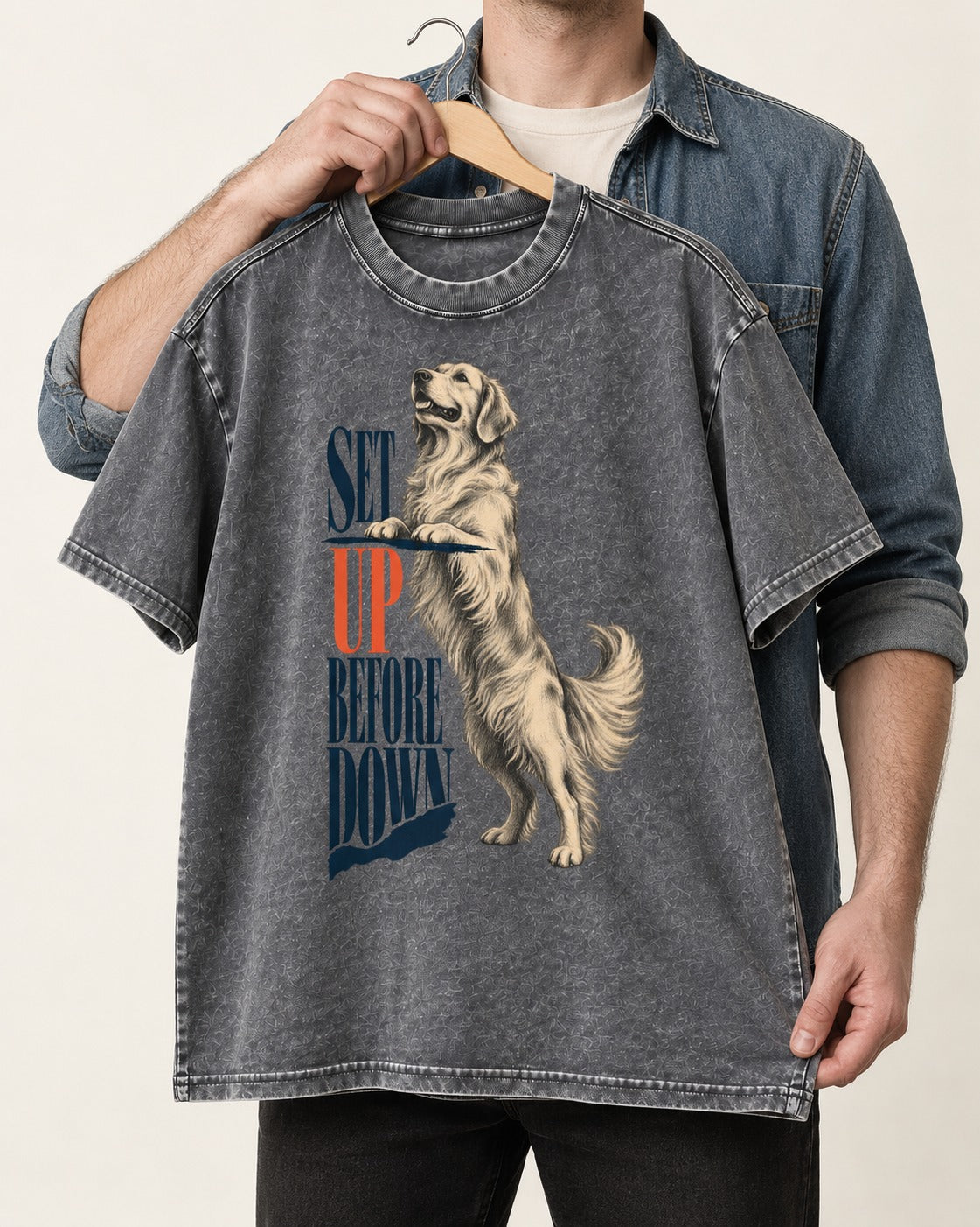 Golden Retriever Set Up Before Down Washed Tee in Gray, held up on a hanger