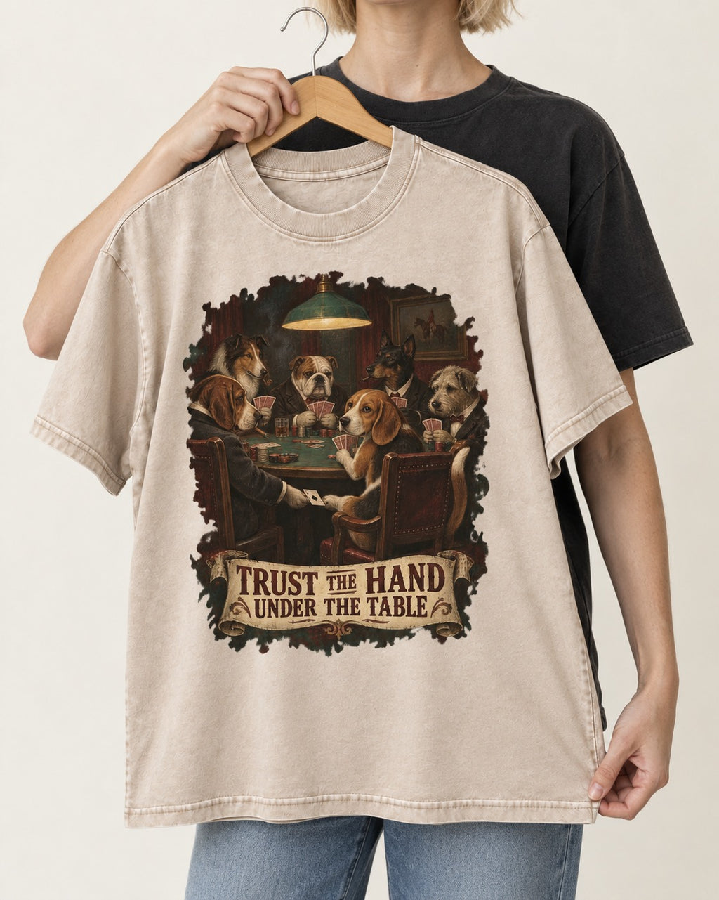 Trust The Hand Under The Table Beagle Poker Night Washed Tee in Apricot, held up on a hanger
