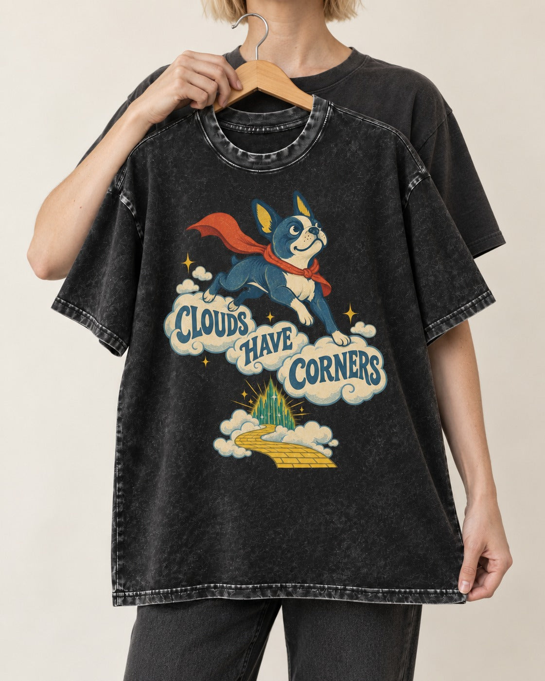 Clouds Have Corners Boston Terrier Washed Tee in Black, held up on a hanger