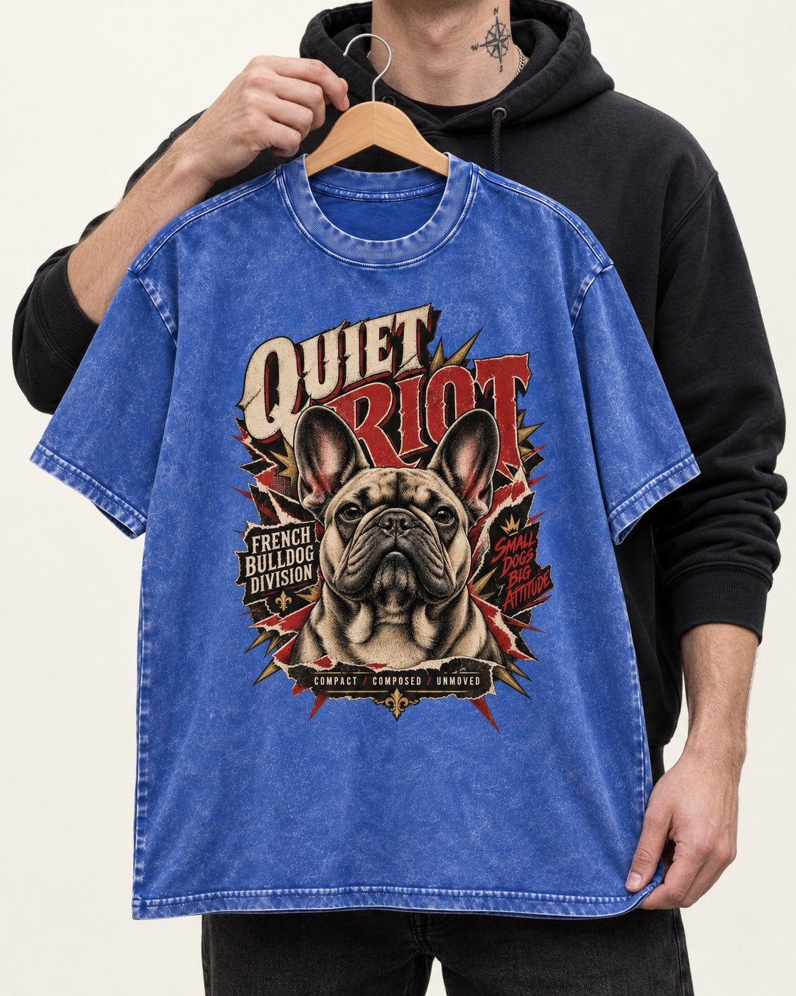Frenchie Quiet Riot Division Emblem Washed Tee in Royal Blue, held up on a hanger