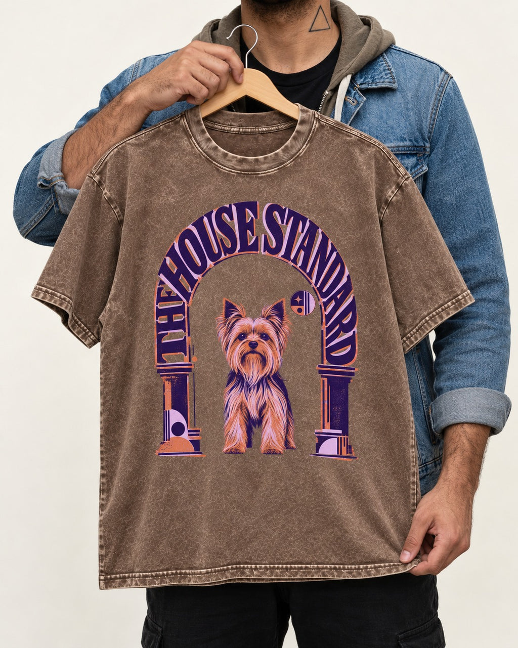 The Yorkshire Terrier House Standard Washed Tee in Coffee, held up on a hanger
