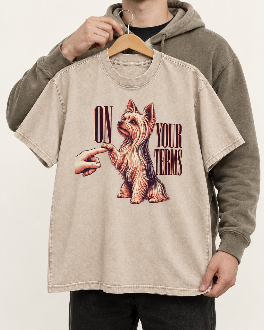 Yorkshire Terrier On Your Terms Washed Tee in Apricot, held up on a hanger