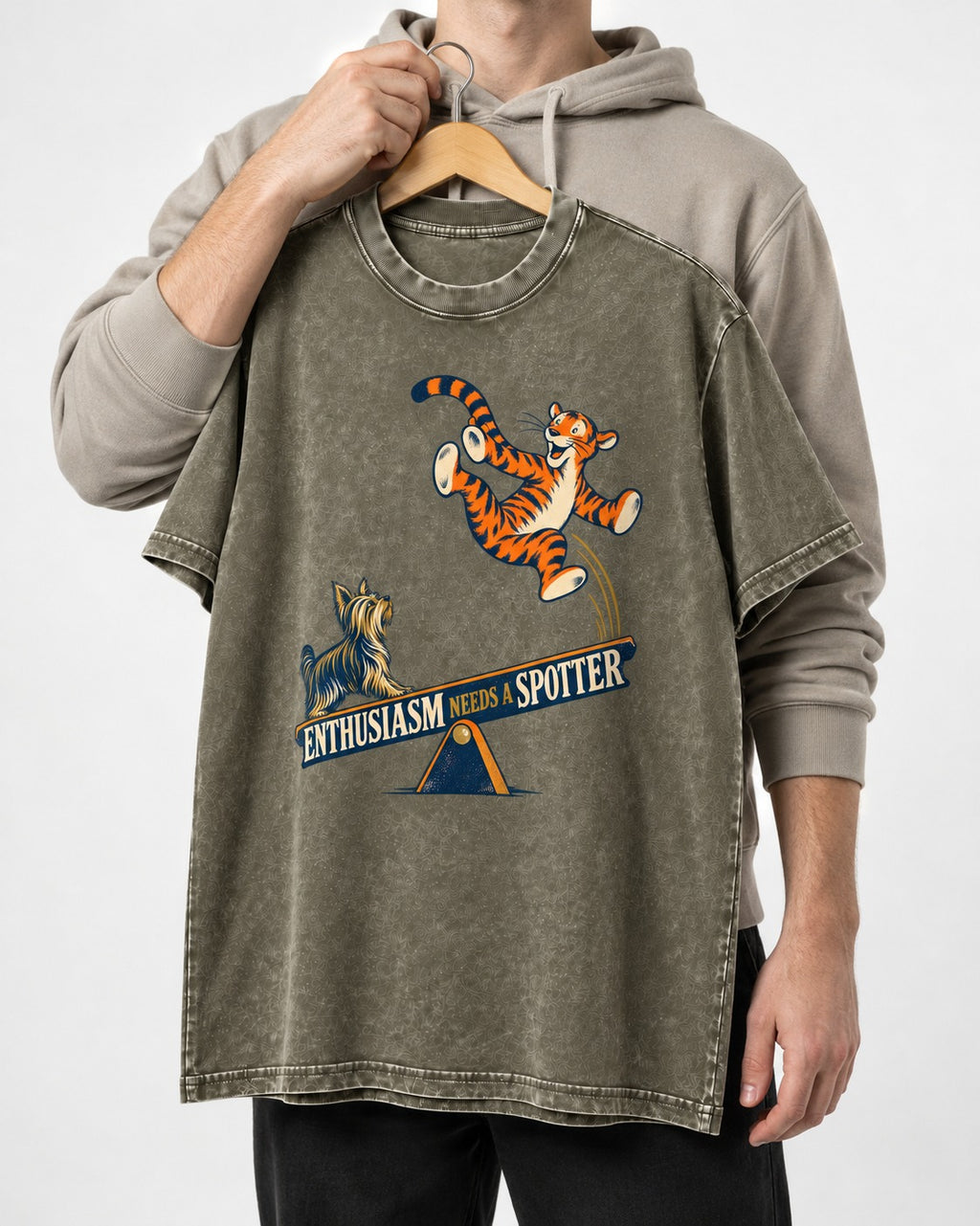 Yorkshire Terrier Enthusiasm Needs a Spotter Seesaw Graphic Washed Tee in Army Green, held up on a hanger