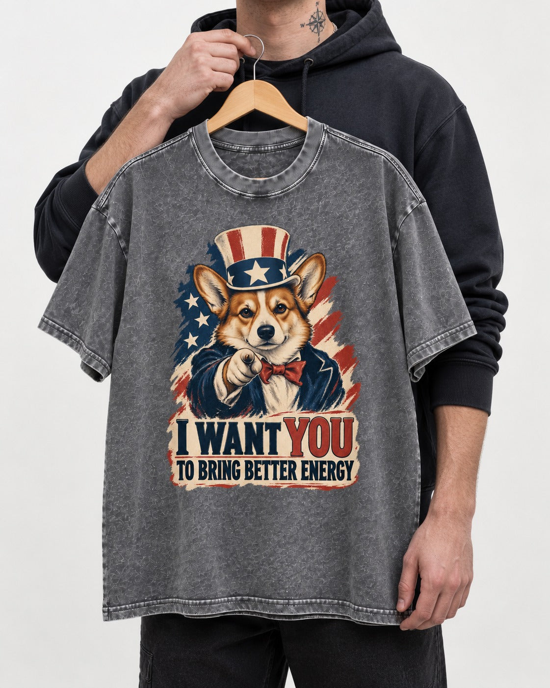 Corgi I Want You to Bring Better Energy Uncle Sam Washed Tee in Gray, held up on a hanger