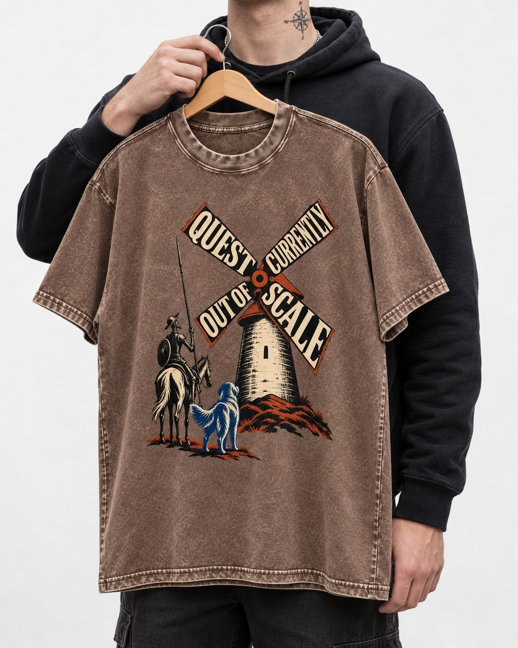 Golden Retriever Quest Out of Scale Washed Tee in Coffee, held up on a hanger