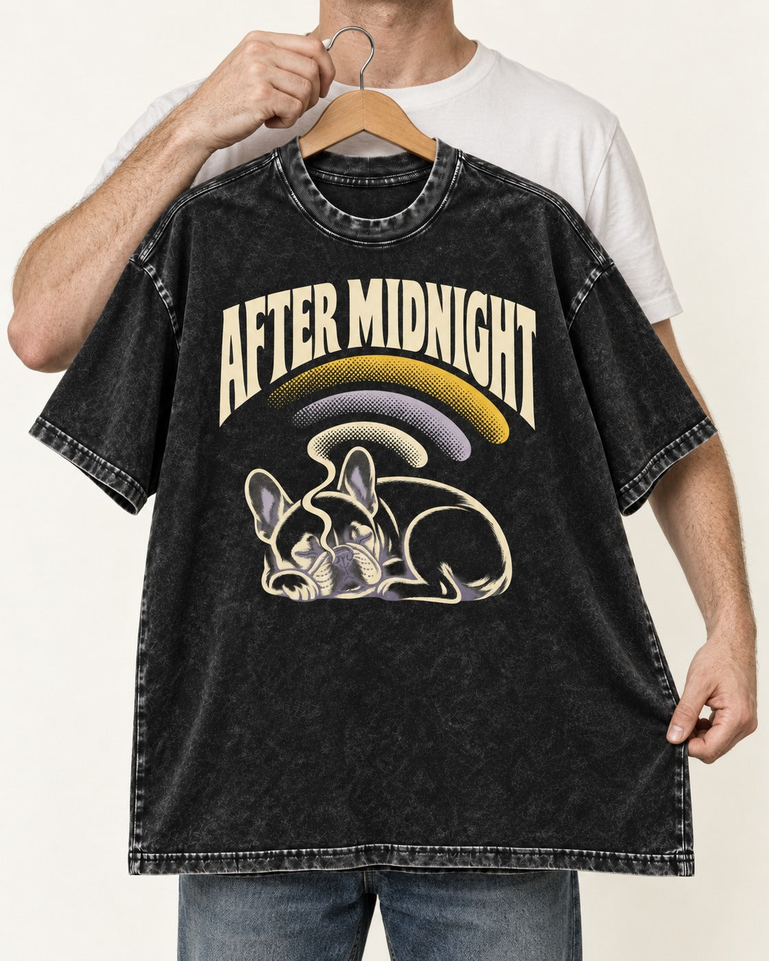 Frenchie After Midnight Sleeping Graphic Washed Tee in Black, held up on a hanger