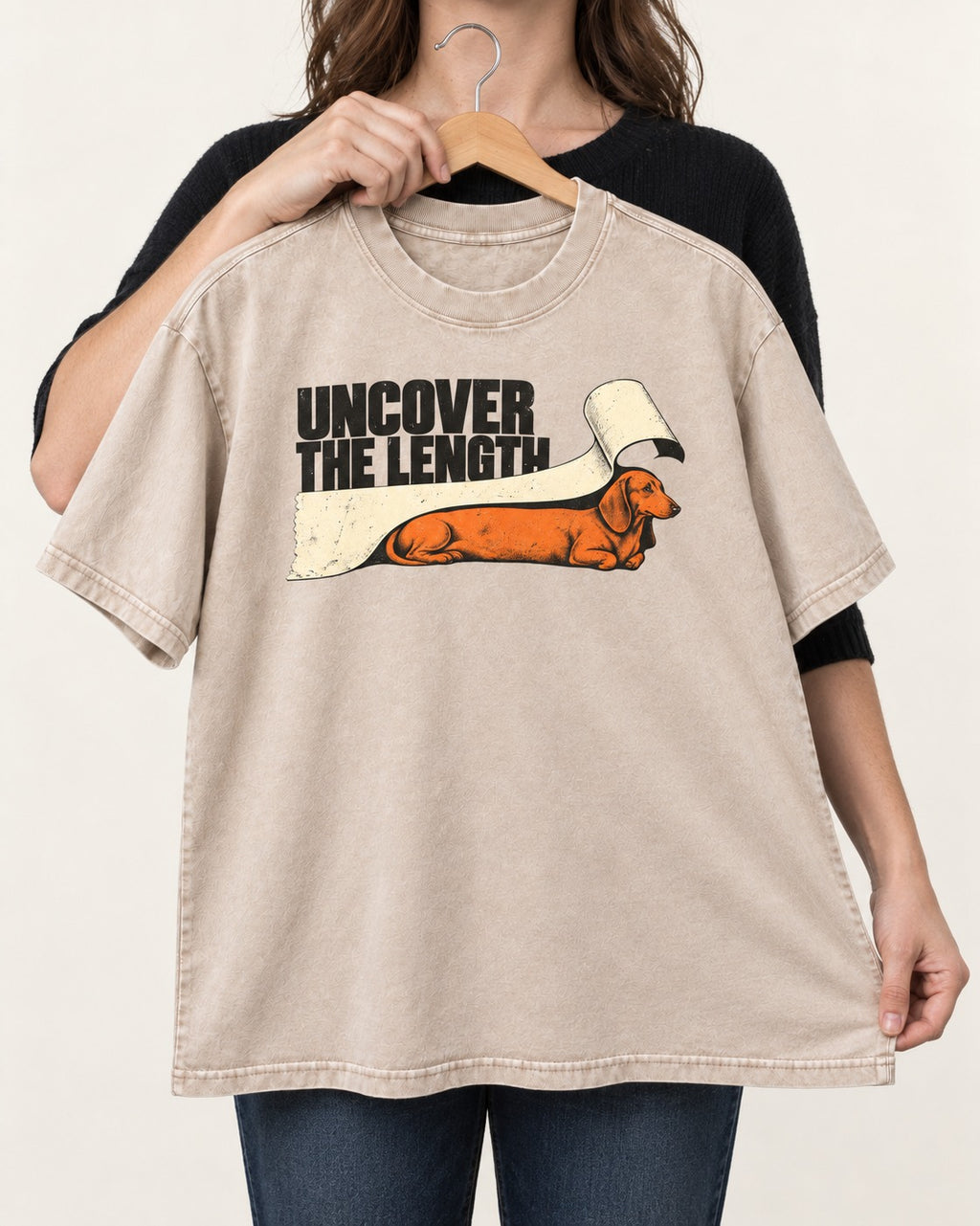 Uncover the Dachshund Length Washed Tee in Apricot, held up on a hanger