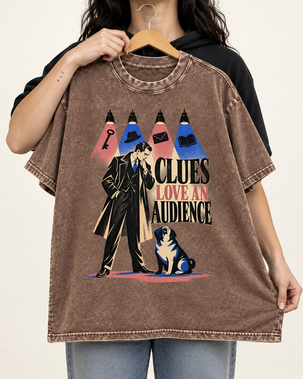 Pug Clues Love an Audience Washed Tee in Coffee, held up on a hanger
