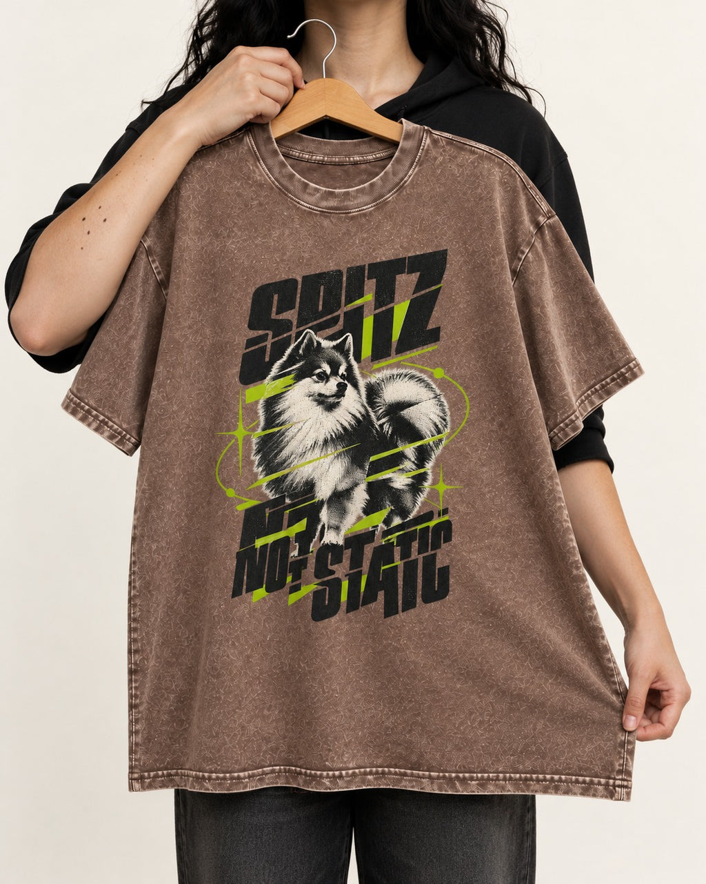 Pomeranian Not Static Washed Tee in Coffee, held up on a hanger