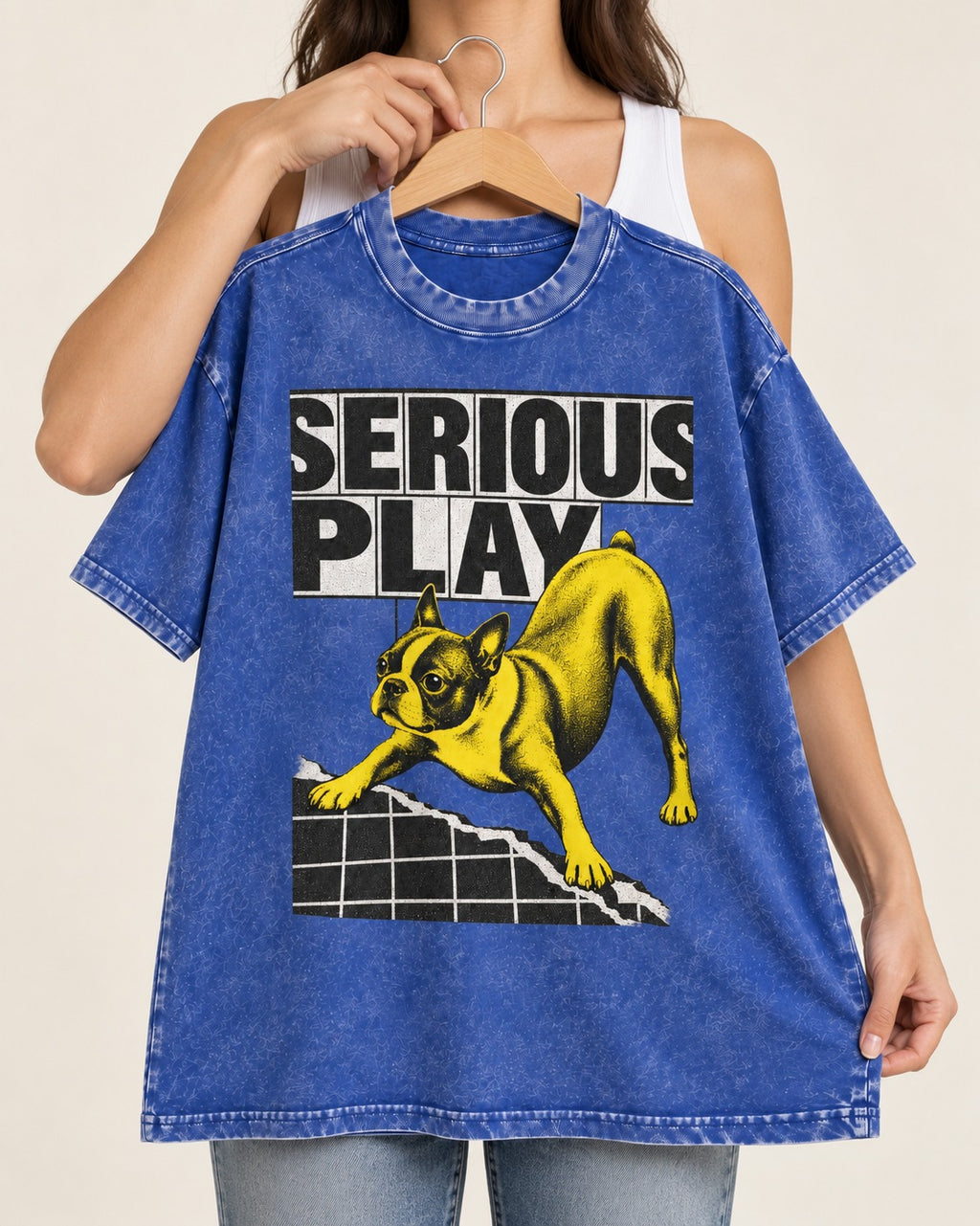 Boston Terrier Serious Play Agility Graphic Washed Tee in Royal Blue, held up on a hanger