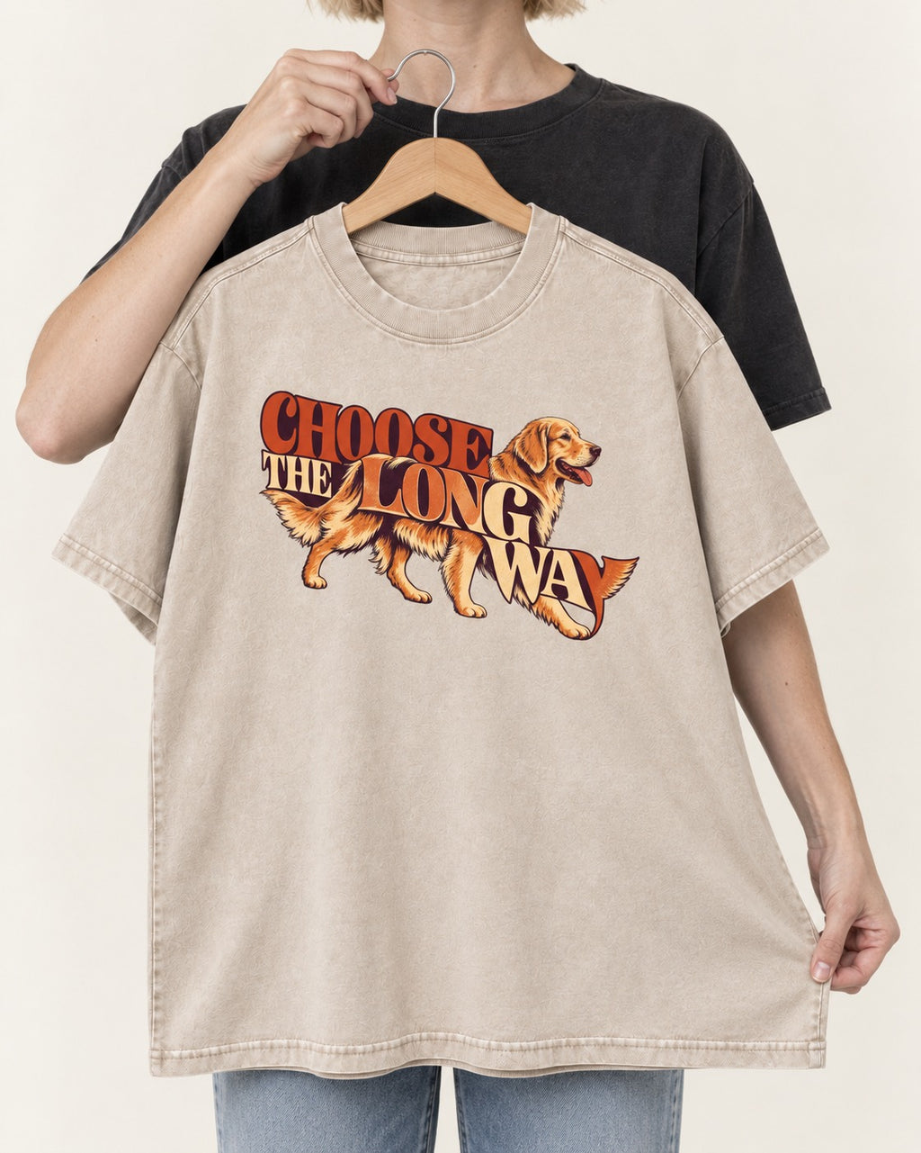 Golden Retriever Choose The Long Way Retro Graphic Washed Tee in Apricot, held up on a hanger
