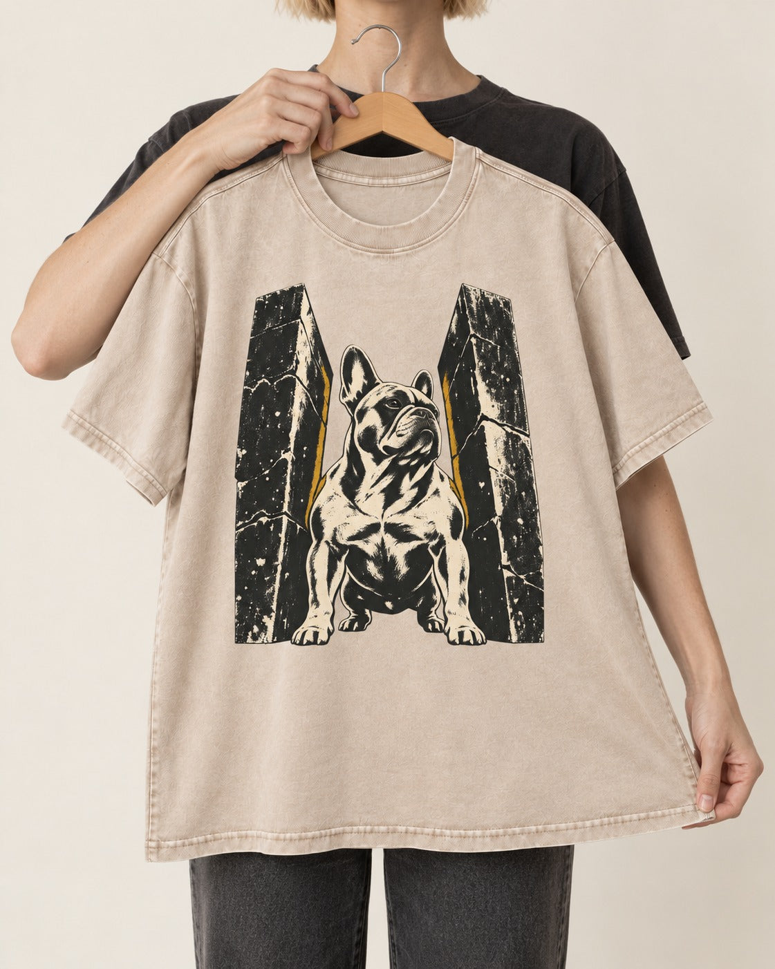 Frenchie Unbreakable Washed Tee in Apricot, held up on a hanger