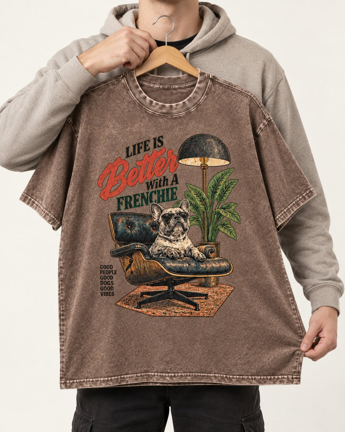 Better with a Frenchie Washed Tee in Coffee, held up on a hanger