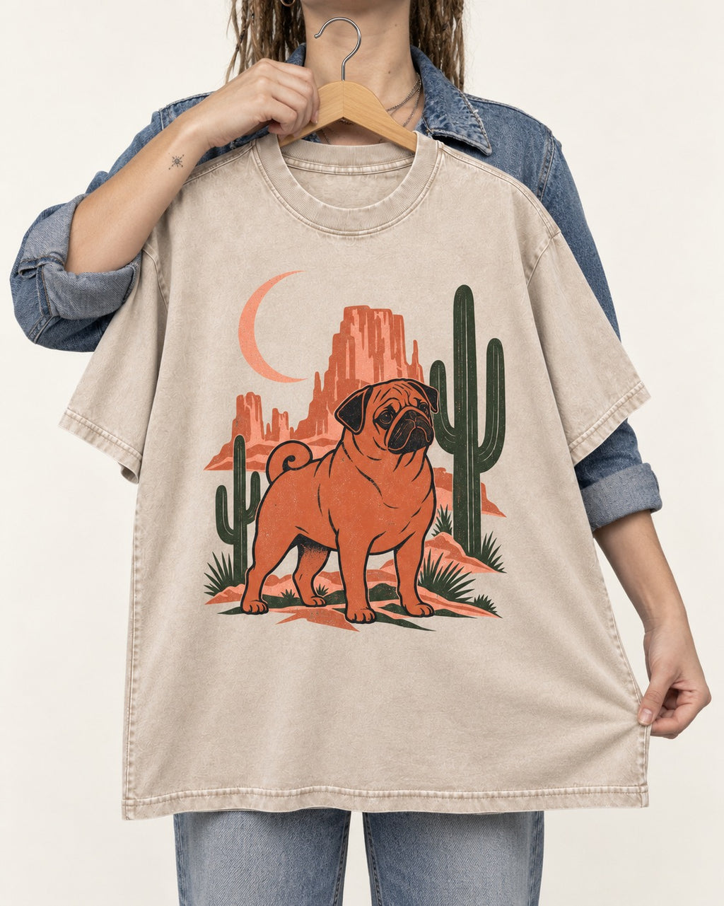 Pug Wild at Heart Washed Tee in Apricot, held up on a hanger
