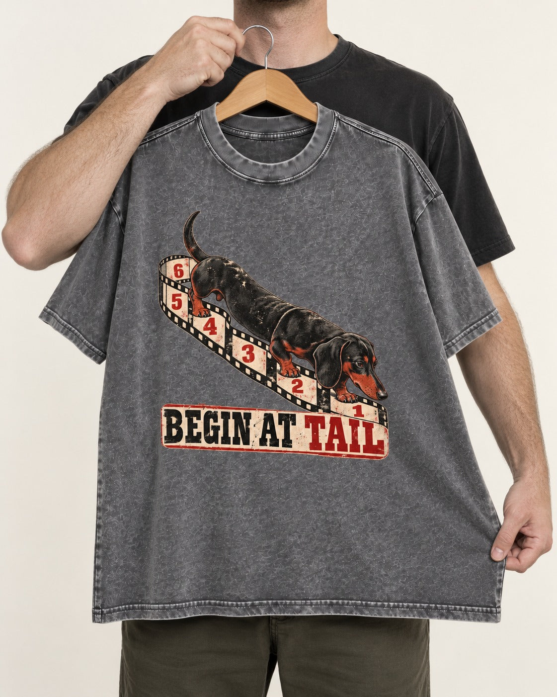 Begin at Tail Dachshund Washed Tee in Gray, held up on a hanger