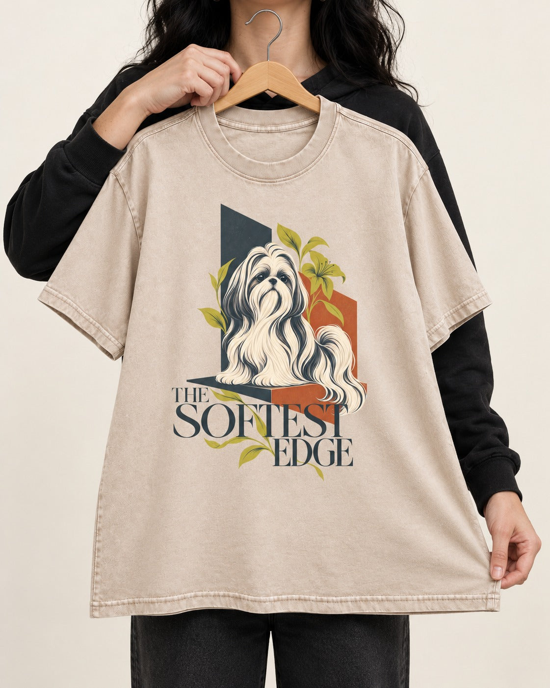 Shih Tzu The Softest Edge Washed Tee in Apricot, held up on a hanger
