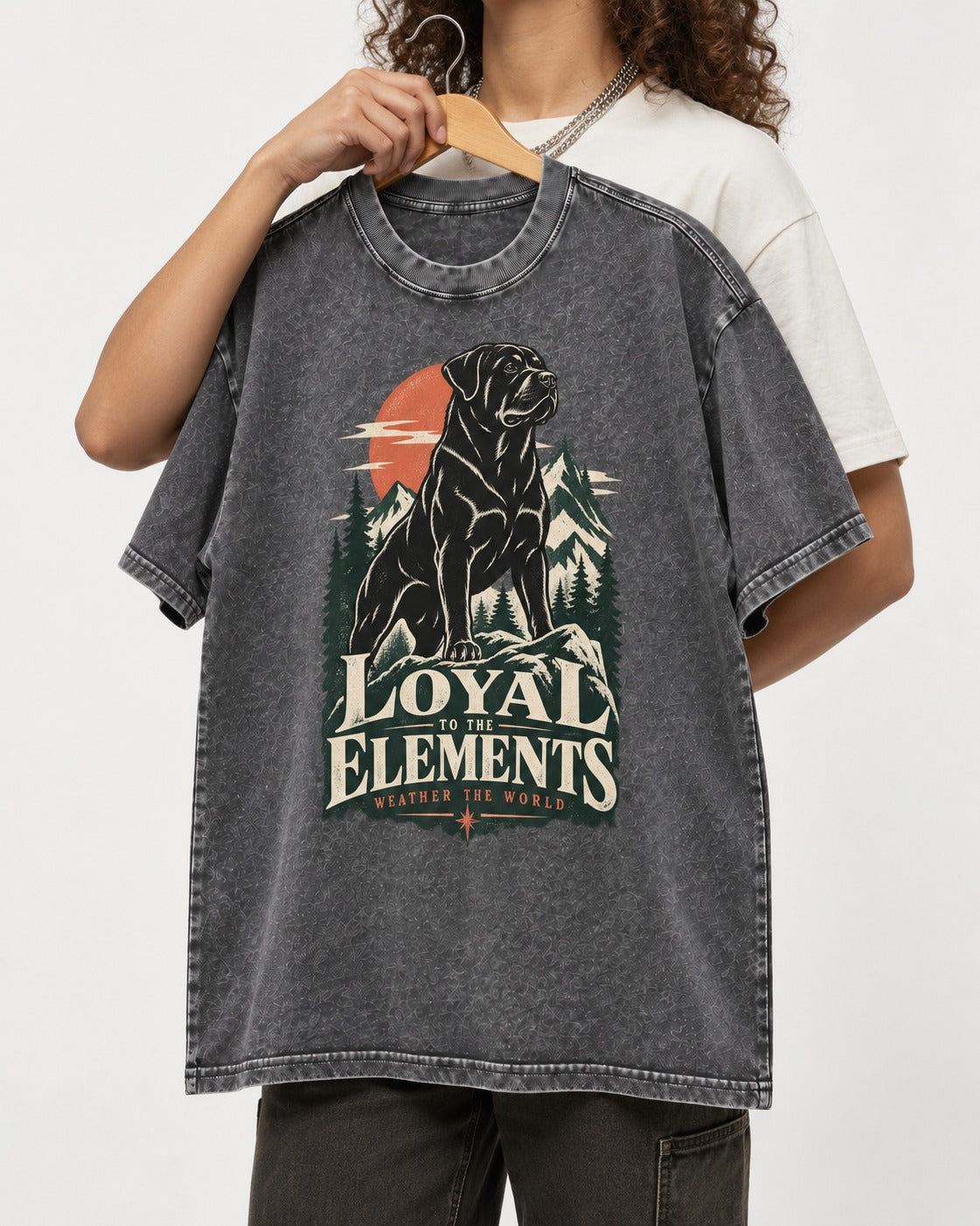 Rottweiler Loyal to the Elements Washed Tee in Gray, held up on a hanger