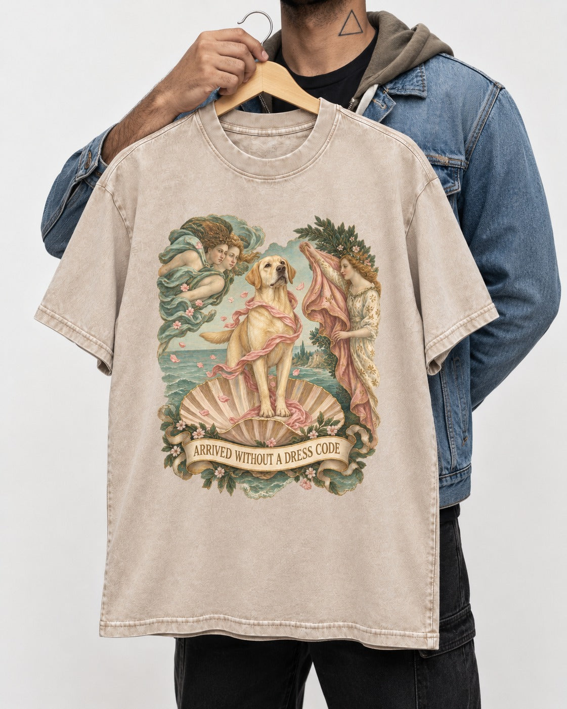 Labrador Retriever Without a Dress Code Washed Tee in Apricot, held up on a hanger