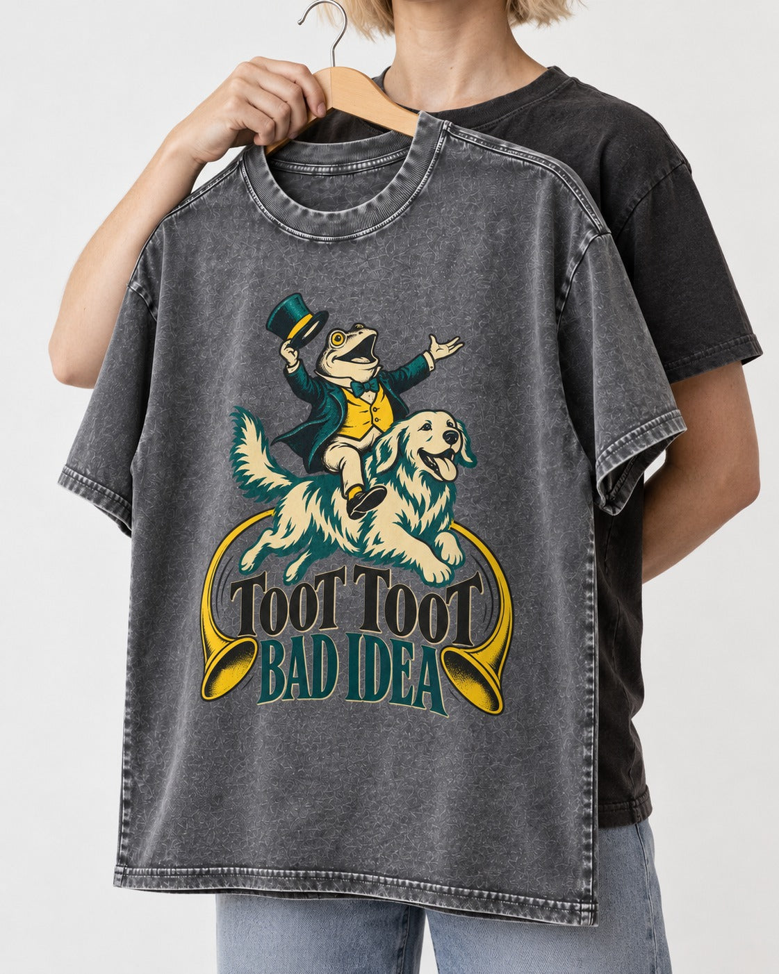 Golden Retriever Toot Toot Bad Idea Washed Tee in Gray, held up on a hanger
