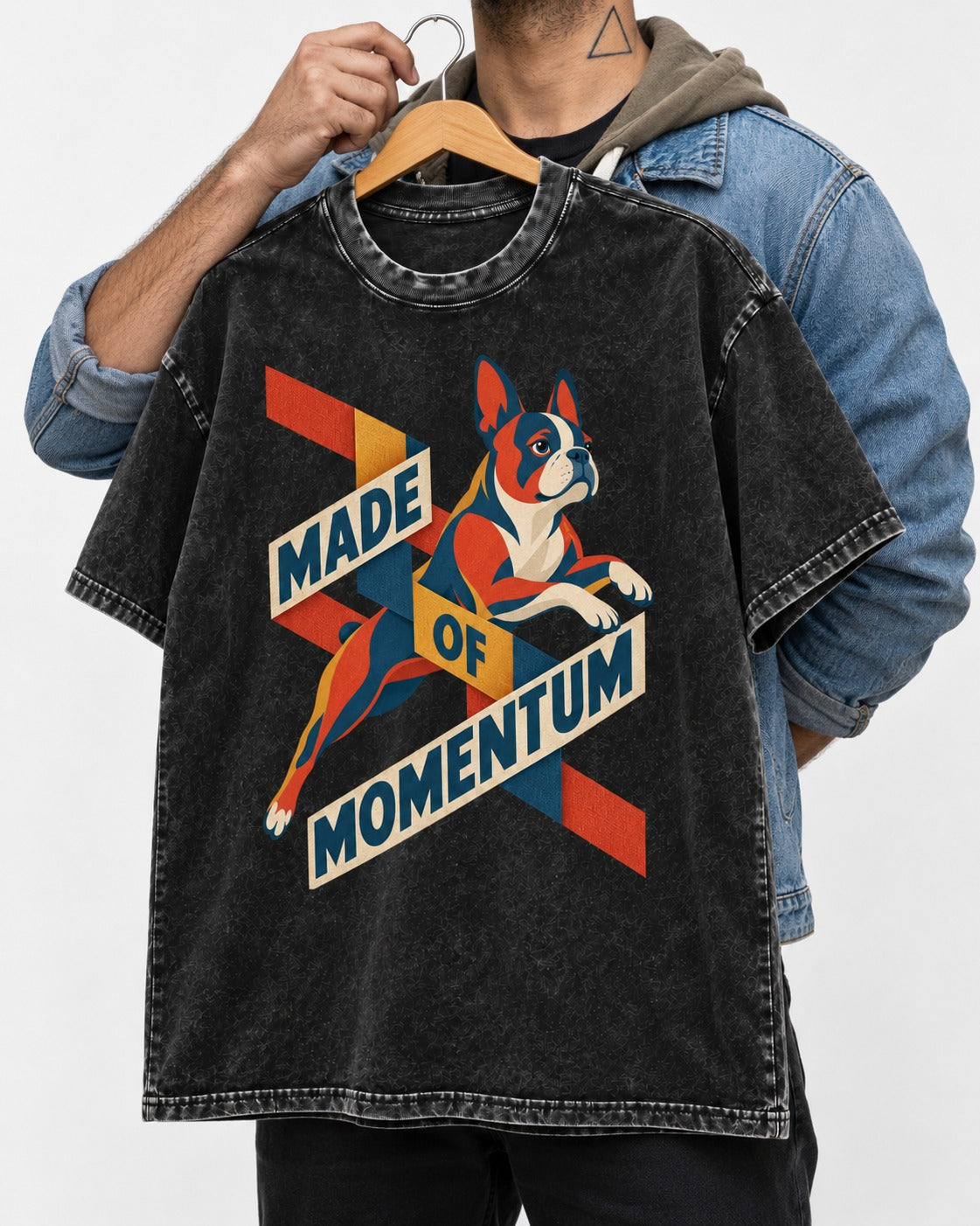 Made of Momentum Boston Terrier Washed Tee in Black, held up on a hanger