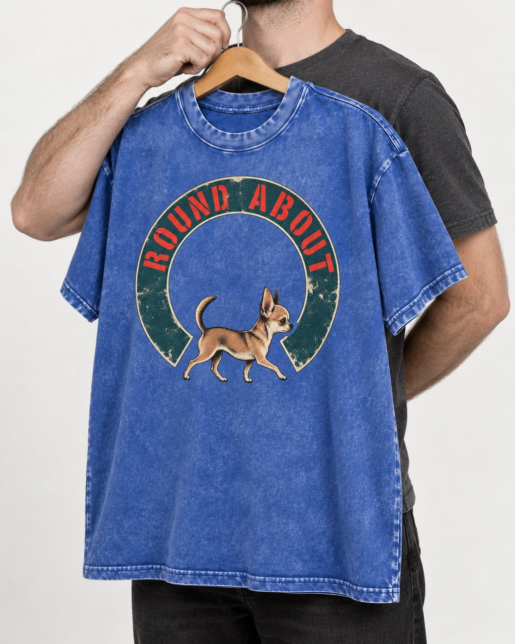 Round About Chihuahua Emblem Graphic Washed Tee in Royal Blue, held up on a hanger