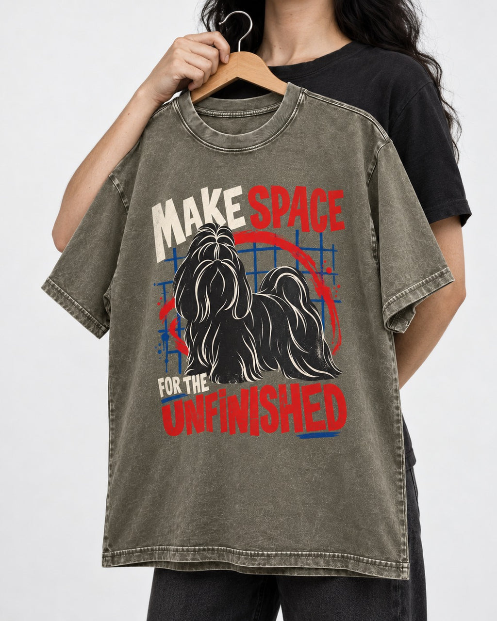Shih Tzu Make Space for the Unfinished Abstract Circle Graphic Washed Tee in Army Green, held up on a hanger