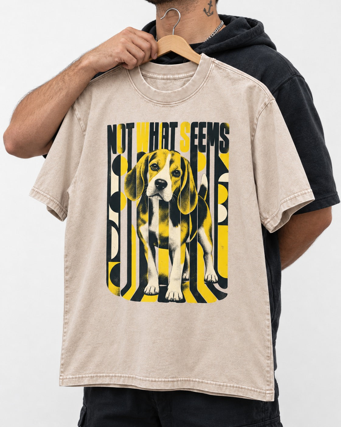 Not What It Seems Beagle Washed Tee in Apricot, held up on a hanger