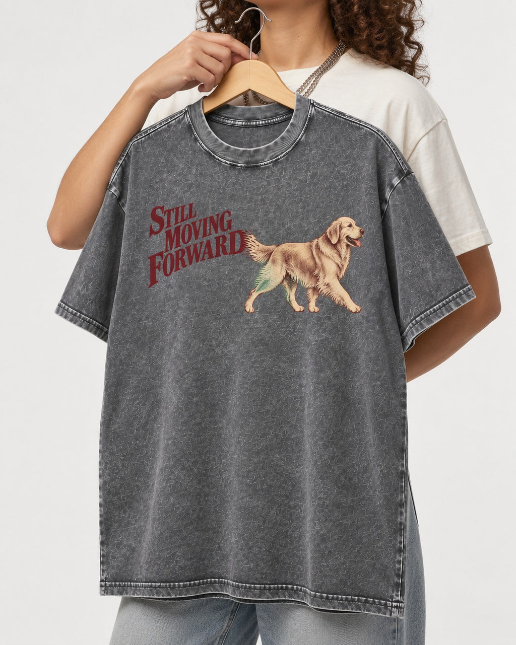 Golden Retriever Still Moving Forward Washed Tee in Gray, held up on a hanger