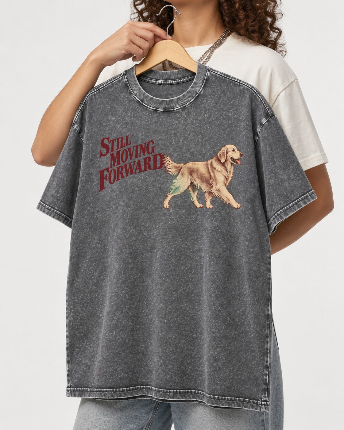 Golden Retriever Still Moving Forward Washed Tee in Gray, held up on a hanger