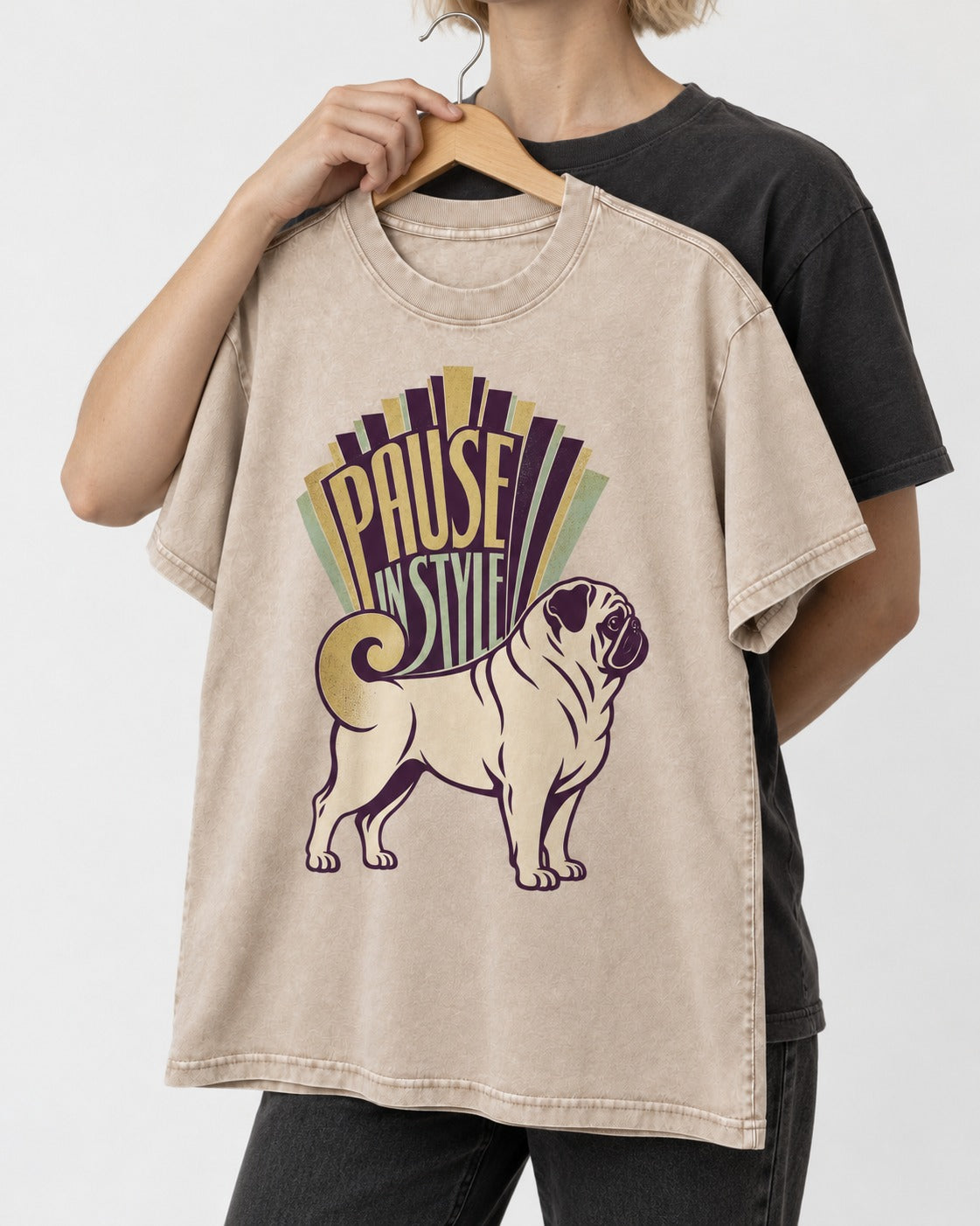 Pug Pause Washed Tee in Apricot, held up on a hanger