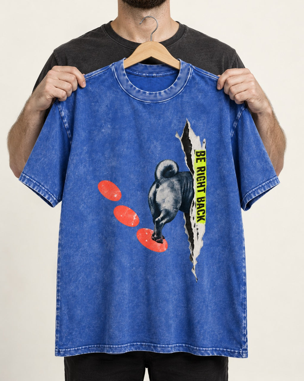 Pug Be Right Back Torn Portal Graphic Washed Tee in Royal Blue, held up on a hanger