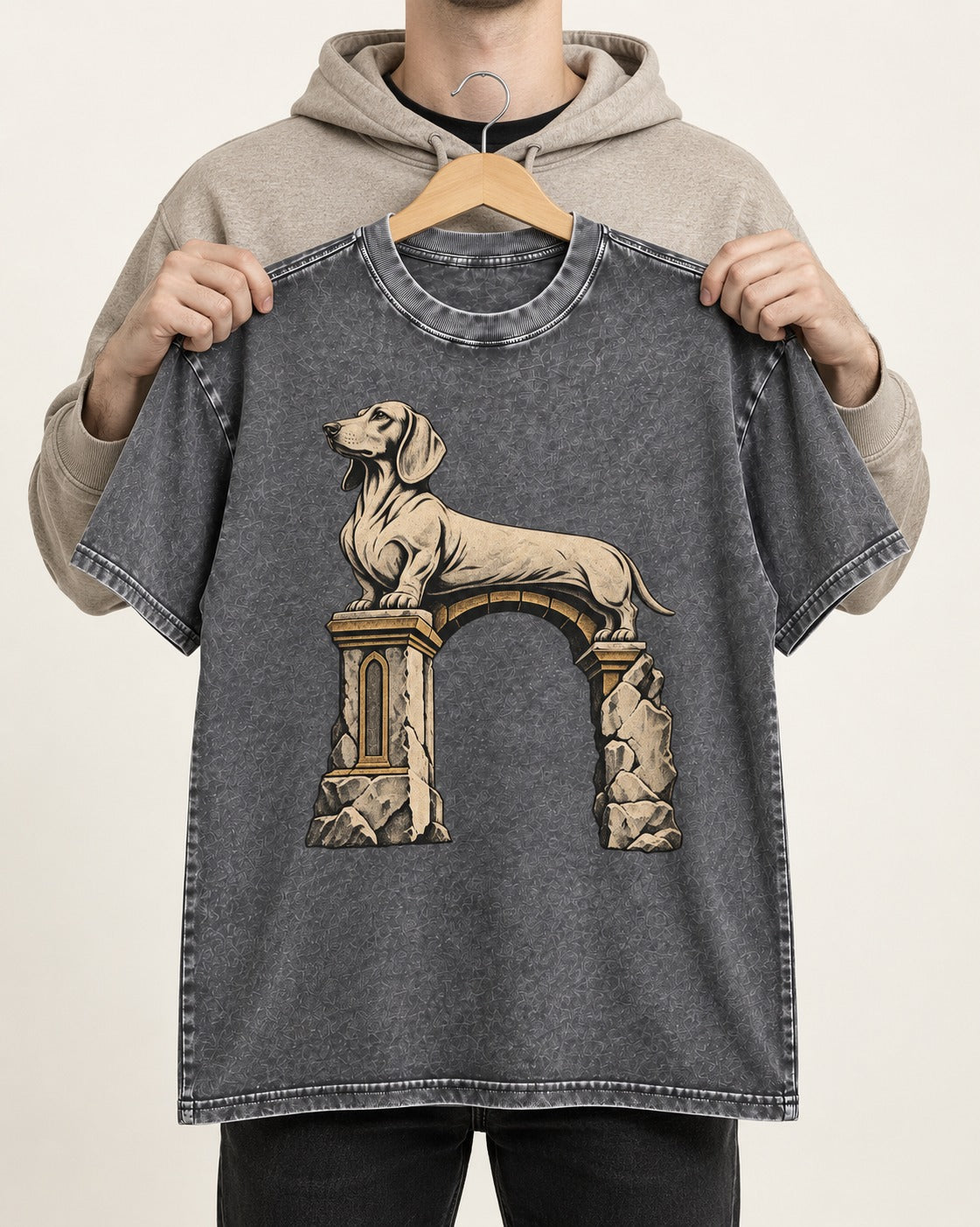 Dachshund Ruined Stone Arch Monument Graphic Washed Tee in Gray, held up on a hanger