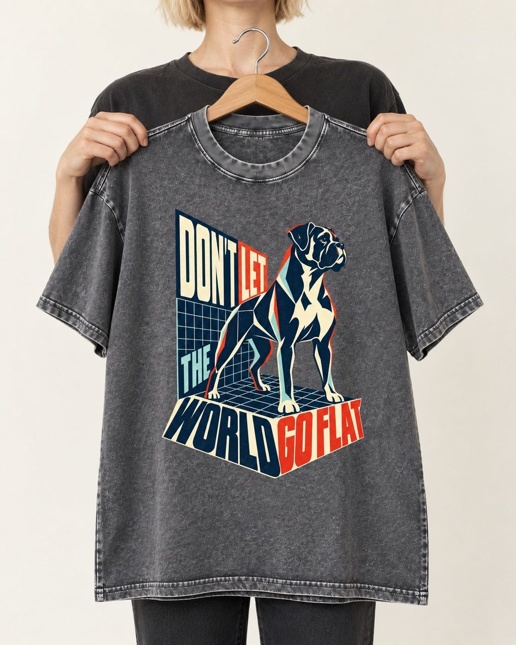 Don't Let the World Go Flat Boxer Perspective Grid Graphic Washed Tee in Gray, held up on a hanger