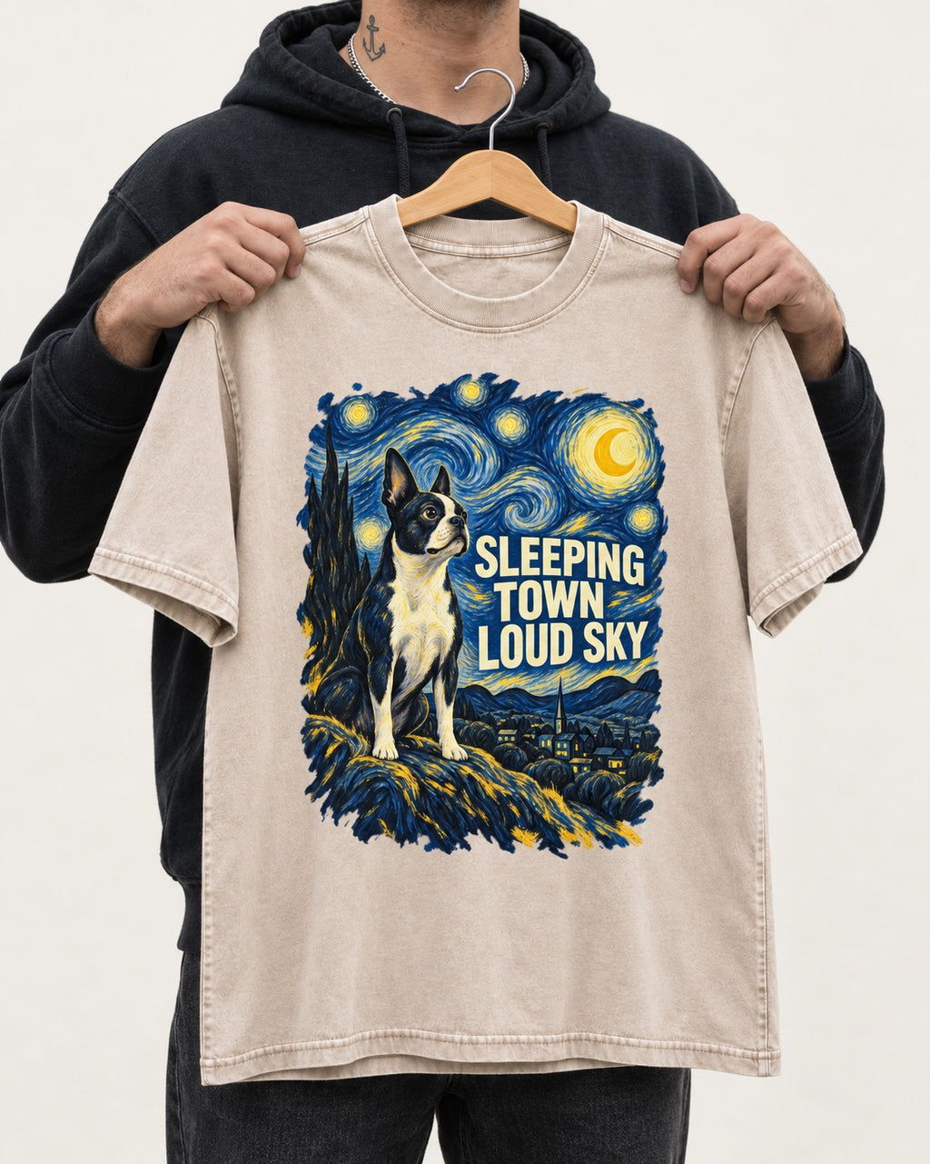 Sleeping Town Loud Sky Boston Terrier Starry Night Washed Tee in Apricot, held up on a hanger