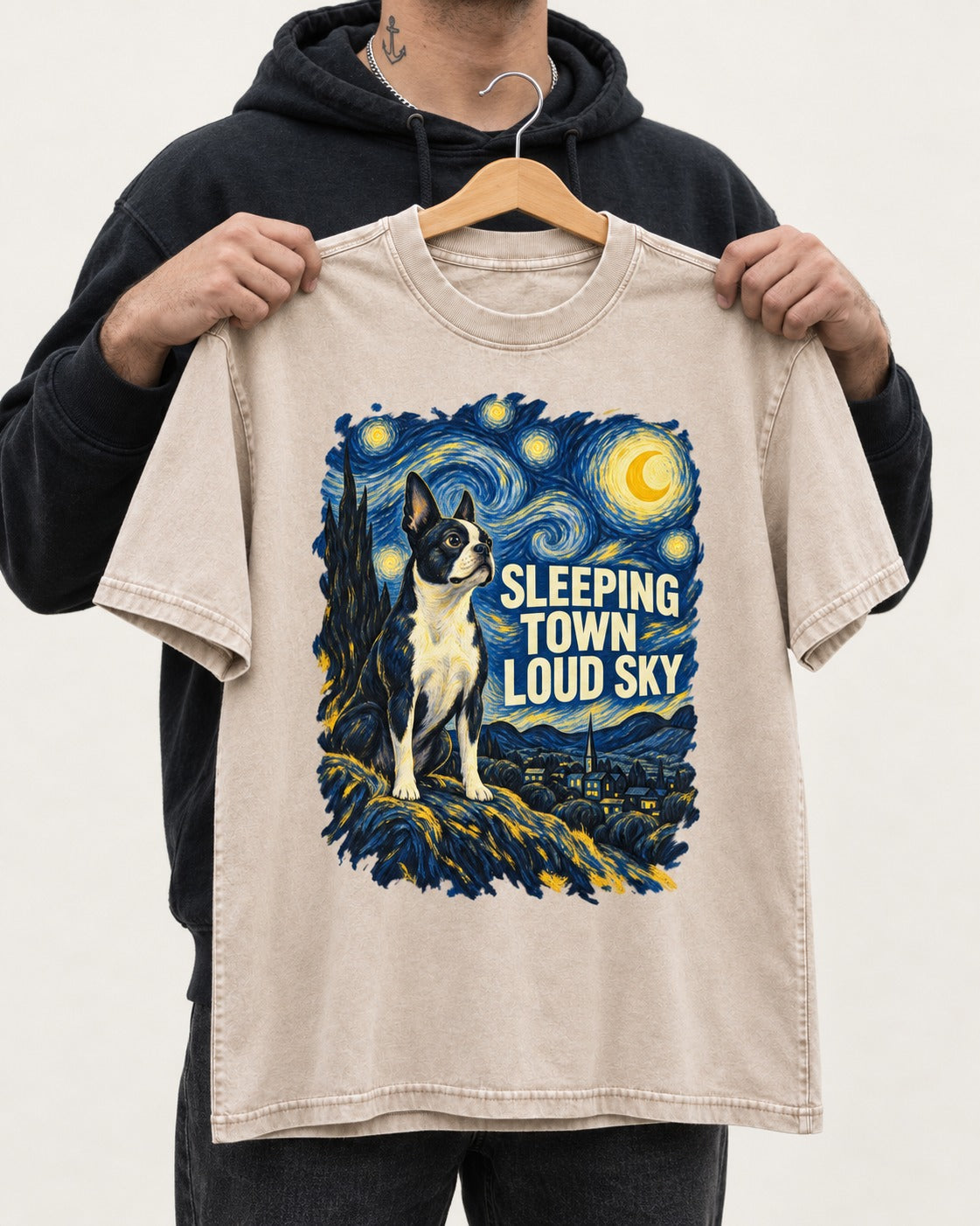 Sleeping Town Loud Sky Boston Terrier Starry Night Washed Tee in Apricot, held up on a hanger