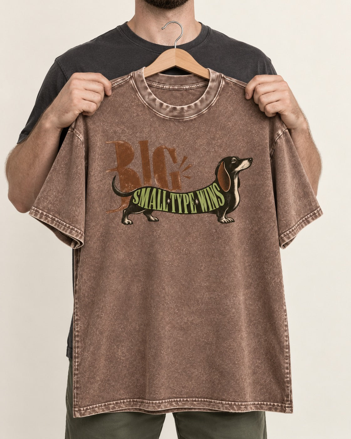 Dachshund Small Type Wins Washed Tee in Coffee, held up on a hanger