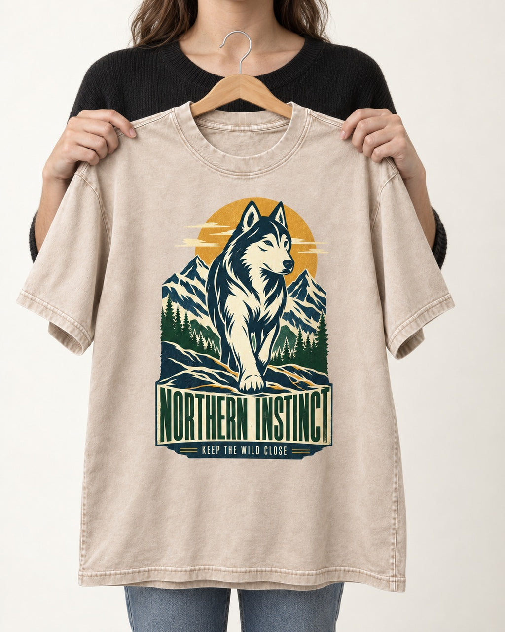Husky Northern Instinct Mountain Sentinel Washed Tee in Apricot, held up on a hanger